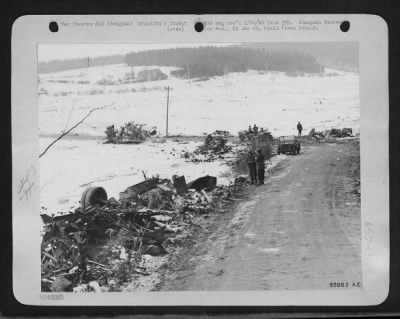 Thumbnail for General > How tactical air power helped to halt von Rundstedt's counter-offensive is exemplified by this photo of a German convoy wrecked by Ninth Air force fighter-bombers during recent fighting in the Houffalize area. A dozen vehicles, including a Sherman