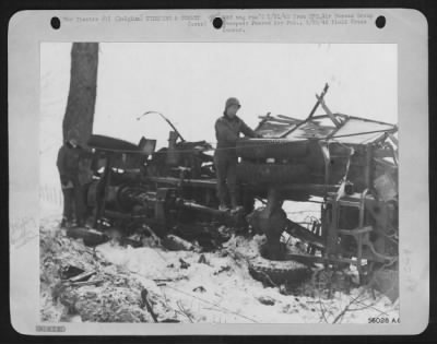 Thumbnail for General > This German truck was transporting a load of ammunition for von Rundstedt's forces in the Belgian Bulge, when 9th Air force fighter-bombers spotted the vehicle and left it in this condition a few miles north of Houffalize, Belgium.