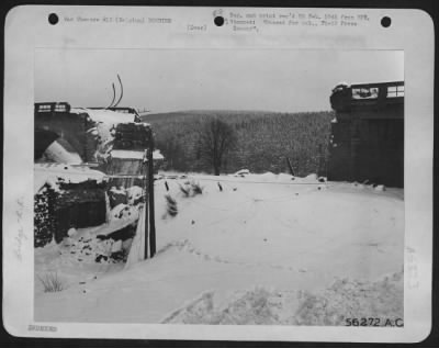 Thumbnail for General > Fighter-bombers of the 9th AF collapsed this railroad bridge east of St. Vith, Belgium to deprive the withdrawing Germans of an "escape" route.