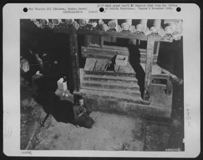 Thumbnail for General > Aged Okinawan Offers Prayers In Ancient Shrine - A 70-Year Old Okinawan Woman, With Hands Clasped And Head Bowed, Was Photographed In The Cave Of The Futema Shinto Shrine While Offering Prayers.  She Granted Permission For This Photograph, Explaining Thro