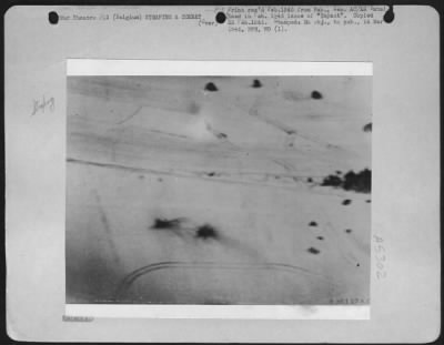 Thumbnail for General > four Nazi tanks were caught dispersed in Field in Bulge area, Belgium, 24 Dec. 1944. Incendiary bullets from 9th fighter-bomber strike the nearest tank, causing it to explode. Many others were also hit.