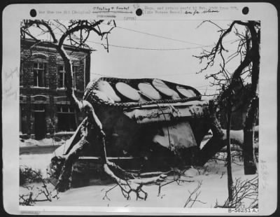 Thumbnail for General > A Mark IV tank destroyed in Houffalize, Belgium, object of repeated bombardments by 9th A.F. medium, light and fighter-bombers before the Germans withdrew from their important communications center.