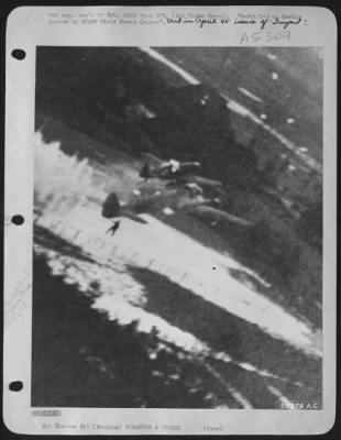 Thumbnail for General > Five of these strange looking contraptions, pick-a-back planes, consisting of a FW 190 fighter mounted on top of a twin-engined JU 88 bomber, were sighted by pilots of the U.S. 8th AF while escorting the heavy bombers during the great attack