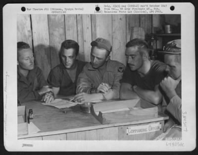 Thumbnail for General > Flight Commanders And Operations Officer Hold Conference On Bombing Missions To Be Executed.  Okinawa, Ryukyu Retto.  163Rd Liaison Squadron.