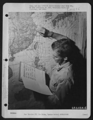 Thumbnail for General > Every Scrap Of Information Given Pilots Before A Mission Must Be As Complete And Accurate As Possible.  Capt. William P. Freligh Of Detroit, Michigan, Checks The Assembled Information In The Group Intelligence Office Of The 318Th Fighter Group On Ie Shima