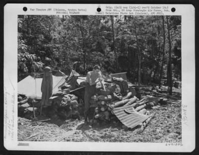 Thumbnail for General > A Gi Washes Himself In Front Of His Shelter In Flight 'B' Area Of The 163Rd Liaison Squadron, Attached To The 10Th Army On Okinawa, Ryukyu Retto.