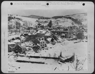 Houffalize > Houffalize, Belgium, an important enemy comunications center during von Rundstedt's advance, as it appeared after repeated bombardments by U.S. Army 9th AF medium, light and fighter-bombers had forced the Germans to withdraw from the town.