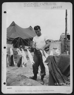 Thumbnail for General > An American 'Gi' Takes Time Out From His Duties To Take Care Of His Personal Laundry.  Okinawa, Ryukyu Retto, 1945.