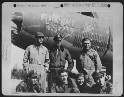 Thumbnail for General > The Crew Of 'Flak Bait', First Martin B-26 Marauder To Complete 200 Missions In This Theater Is Shown By The Battle-Scarred Bomber Just After Completing Its 200Th Mission.  They Are, Front Row, Left To Right: 1St. Lt. William D. Brearly, Of New York, Bomb