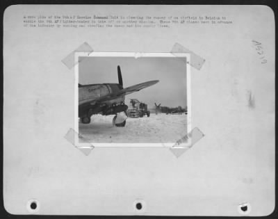 Thumbnail for General > A Snow Plow Of The 9Th Af Service Command Unit Is Clearing The Runway Of An Airfield In Belgium To Enable The 9Th Af Fighter-Bomber To Take Off On Another Mission.  These 9Th Af Planes Keep In Advance Of The Infantry By Bombing And Strafing The Enemy And