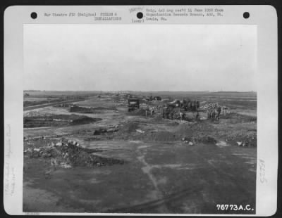 Thumbnail for General > Personnel Of The 834Th Engineer Aviation Battalion Fill Up Bomb Crater During The Repair Of An Airfield At St. Trond, Belgium, 27 September 1944.