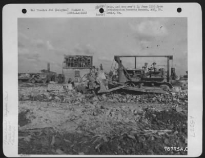 Thumbnail for General > A Bulldozer, Operated By A Member Of The 834Th Engineer Aviation Battalion Clears A Field In Preparation For Construction Of An Airfield At St. Trond, Belgium.  1 October 1944.