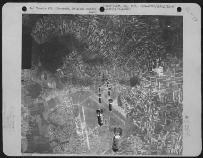 Brussels > Destructive Bombs Fall Toward Brussels/Melbroek Airfield, Belgium During A Bombing Mission On 14 June 1944 By Planes Of The 96Th Bombardment Group, 8Th Air Force.