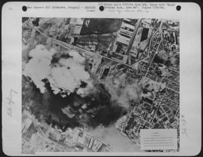 Thumbnail for Budapest > The main weight of the attack fell on the Finished Products Storage area.-A considerable number of hits were scored on the main refinery and on the Oil Storage Depot.-Budapest, Hungary.