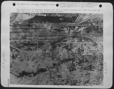 Thumbnail for Debreczen > The railroad yard at Debreczen, Hungary after the U.S. Flying ofrtresses hit them 2 June 1944, and then flew on for the first time to new bases in Russia.