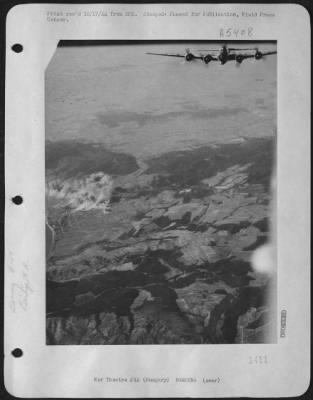 Budapest > This Boeing B-17 "Flying Fortress" Of The 15Th Air Force Leaves The Smoldering Szob Railroad Bridge, N. Budapest, Hungary On Sept. 20, 1944.  An Oncoming Wave Of Forts Can Be Seen In The Left Hand Corner Of The Photo.