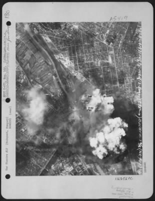 Thumbnail for Budapest > As Smoke From Previous Bomb Bursts Covers The Oil Refinery At Budapest, Hungary, More Bombs Streak Dounward To Add To The Destruction, During A Raid By Planes Of The 455Th Bomb Group, 742Nd Bomb Squadron, 15Th Air Force On July 2, 1944.