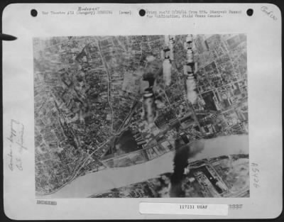 Thumbnail for Budapest > A Mess Of Bombs Drop Toward The Shell Koolaz And Fanto Oil Refineries, Near Budapest.  These Vital Refineries Were Completely Neutralized By The 15Th Air Force In A Fierce Attack On June 14Th, 1944.