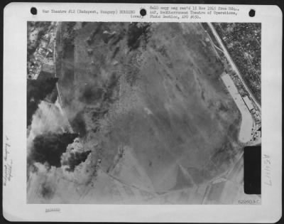 Thumbnail for Budapest > Bombs Dropped By Consolidated B-24 "Liberators" Of The 15Th Air Force Explode On The Vesces Airdrome Near Budapest, Hungary On 13 April 1944.