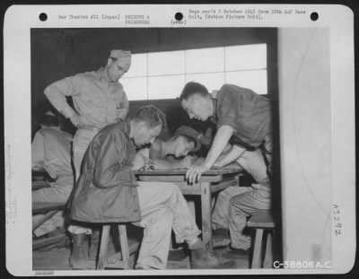 General > Released Prisoners Of War Being Processed By Recovered Personnel Team Number 68 At Yokohama Docks Before Boarding Hospital Ship.  Japan, September 1945.