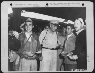 Thumbnail for General > Lt. General Robert Eichelberger With Prisoners Of War On The Station Platform Of Yokohama Railroad Station, Japan.  September 1945.