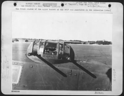 Thumbnail for Battle Damage > The front window of the upper turret of the B-17 was punctured in the submarine yard mission at Kiel, May 14.