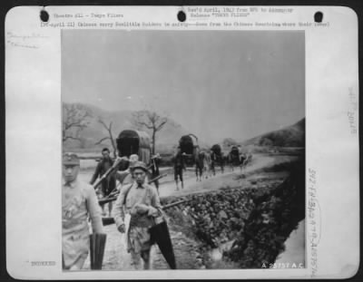 General > Chinese carry Doolittle Raiders to safety---Down from the Chinese Mountains, where their Bomber was forced down, comes a group of American fliers riding in native conveyances on the shoulders of admiring natives.