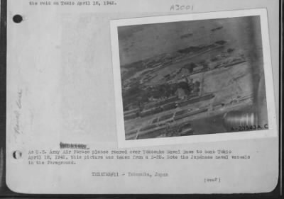 General > As U.S. Army Air forces planes roared over Yokosuka Naval Base to bomb Tokio April 18, 1942, this picture was taken from a B-25. Note the Japanese naval vessels in the foreground. Two views of Yokosuka Naval Base taken during the U.S. Army Air forces