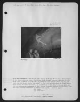 Thumbnail for BACK FROM BRUNSWICK---The Eighth AAF Flying ofrtress "F for Frenesi," piloted by Lt. Cely, with his crew, including three wounded gunners, returned to its base "just a series of holes held together by some metal" after dropping its bombs on the - Page 1