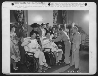 Ceremonies & Decorations > Courage and wounds are honored at Walter Reed General Hospital, Washington, D.C. in the first such ceremony conducted at the Army Medical Center during this World War. Major General Millard F. Harmon Chief of the Air Staff of the Army Air forces