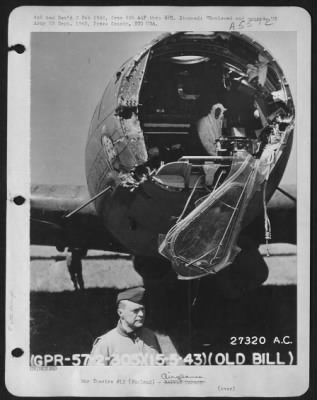 Thumbnail for Battle Damage > The Plexi-glass nose of this Boeing B-17 Flying ofrtress was not removed by mechanics, it was shot during a savage attack by swarms of FW 109s after a raid over Northwest Germany. This picture of "Old Bill" was taken a few minutes after the wounded