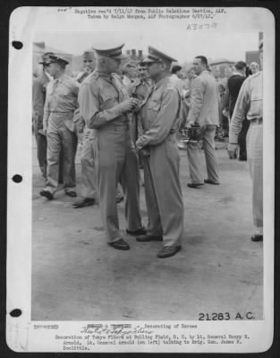 Thumbnail for Ceremonies & Decorations > Decoration of Tokyo Fliers at Bolling Field, D.C. by Lt. General Henry H. Arnold. Lt. General Arnold (on left) talking to Brig. Gen. James H. Doolittle.