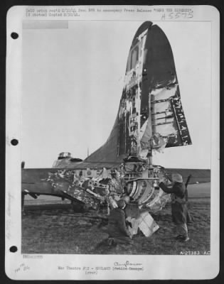 Thumbnail for Battle Damage > With only ragged pieces of tail left, this B-17 ofrtress was brought back safely to its base in England. Crews of other planes had seen the ofrtress, "Hang the Expense Again III", have its tail almost entirely shot off over France and figured it had