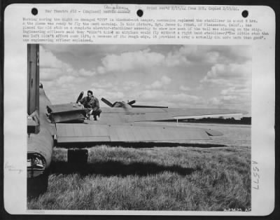 Thumbnail for Battle Damage > Working during the night on damaged "079" in blacked-out hangar, mechanics replaced the stabilizer in about 8 hrs. & the plane was ready to fly the next morning. In this picture, Sgt. James G. Frost, of Pleasanton, Calif., has placed the old stub on