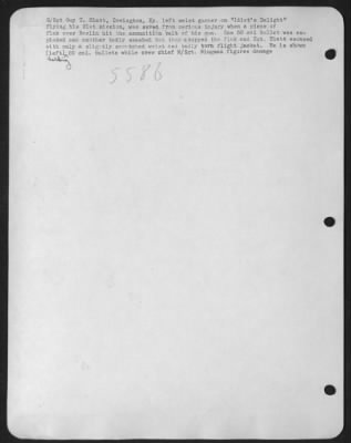 Battle Damage > S/Sgt Guy T. Hiatt, Covington, Ky. Left waist gunner on "Idiot's Delight" flying his 21st mission, was saved from serious injury when a piece of flak over Berlin hit the ammunition belt of his gun. One 50 cal bullet was exploded and another badly