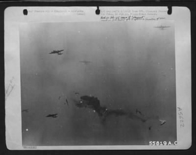 Battle Damage > Returning from a daylight bombing assault on important synthetic oil plants and key communications centers just behind von Rundstedts lines, two Boeing B-17 Flying ofrtresses collide in mid-air and disintegrate. None of the crews of either plane