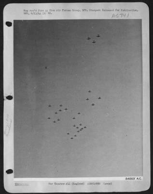 Thumbnail for Boeing > First authentic photo of formations of Boeing B-17 Flying ofrtresses from 8th AF heavy bomber station in England massing for flight at dawn for D-Day bombing mission.