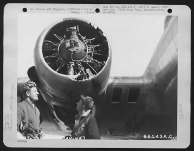 Thumbnail for Battle Damage > Lt. Brashere And S/Sgt. Edwards Examine A Boeing B-17 "Flying Fortress" Engine That Was Damaged During A Mission Over Enemy Territory.  381St Bomb Group, England, 24 March 1945.