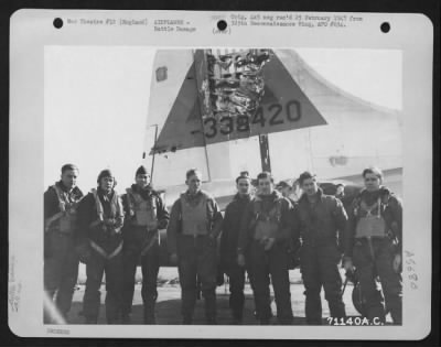 Battle Damage > The Crew Of The Boeing B-17 "Flying Fortress" (A/C No. 338420) Poses In Front Of The Damaged Tail Of The Plane At An 8Th Air Force Base In England On 2 October 1944.  379Th Bomb Group.