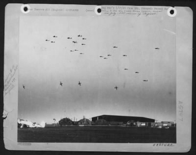 Thumbnail for Boeing > In The Skies Over An Eighth Air Force Fighter Base In England, North American P-51 Mustangs Peel Off To Land, While Boeing B-17 Flying Fortresses Fly On To Their Home Base.  On The Ground, Ground Crewmen Are 'Sweating 'Em Out'.  353Rd Ftr Group, Raydon En