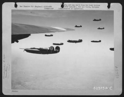 Consolidated > A Formation Of Consolidated B-24 "Liberators" Of The 2Nd Bomb Division, 8Th Air Force, Enroute To Bomb Enemy Installations Somewhere In Europe, 24 November 1944 [Replaced With 1943].  392 Bomb Group.