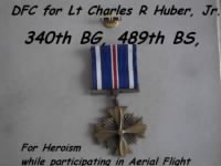 340thBG, 489thBDS, Lt Charlie Huber, Jr. earned a DFC for Heroism during Aerial Flight.