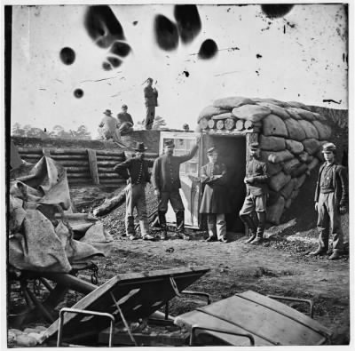 Thumbnail for 1327 - Fort Burnham, Va. (the former Confederate Fort Harrison). Federal soldiers in front of bomb-proof headquarters