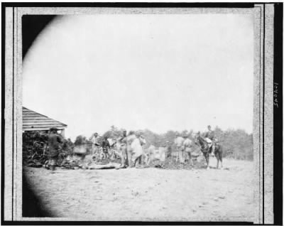 Thumbnail for 1761 - Scene of Ewell's attack, May 19, 1864, near Spottsylvania [i.e. Spotsylvania] Court House. 1st Mass. Artillery burying the dead