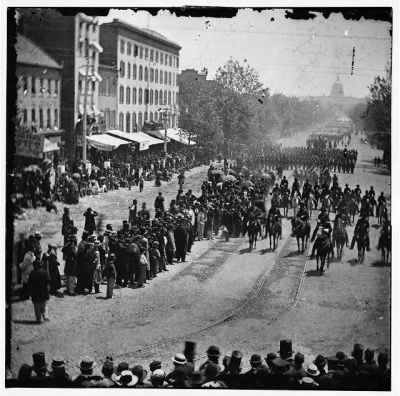 Thumbnail for 1801 - Washington, District of Columbia. The Grand Review of the Army. Gen. Henry W. Slocum (Army of Georgia) and staff passing on Pennsylvania Avenue near the Treasury