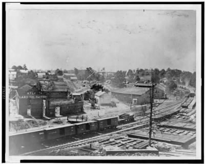 Thumbnail for 2166 - View of Atlanta, Georgia, with railroad cars in left foreground