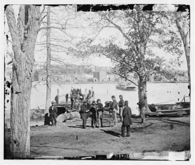 3354 - Washington, D.C. Guards at ferry landing on Mason's Island examining a pass