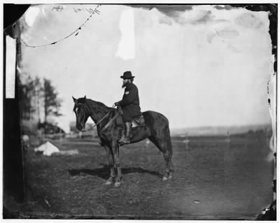 3634 - [Brandy Station], [Virginia]. Alfred R. Waud, artist for 'Harper's Weekly' (seated on a horse) at headquarters Army of the Potomac