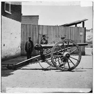 3937 - Richmond, Virginia. Whitworth gun on wharf awaiting shipment