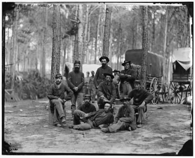 4189 - Petersburg, Va. Group of Company B, U.S. Engineer Battalion; wagons in background